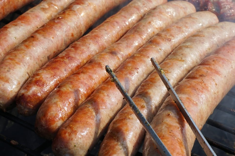 Sausages cooking on a bbq. Image sourced from https://www.peakpx.com/498080/grilled-sausages, creative commons licence CC0 1.0 Universal (CC0 1.0) Public Domain Dedication